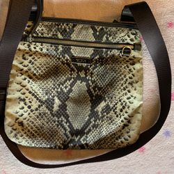 TUMI designer crossbody purse 