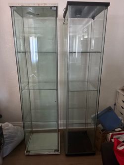 FREE glass cabinet with shelves.