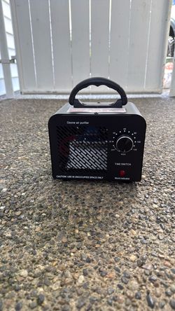 Portable Ozone Air Purifier with Timer. New and never used.