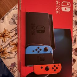 Nintendo Switch Plus Two Games 