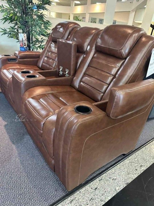 The Man-Den Gray Power Reclining Sofa And Loveseat
Ashley Furniture $10 Down Payment Financing And Delivery