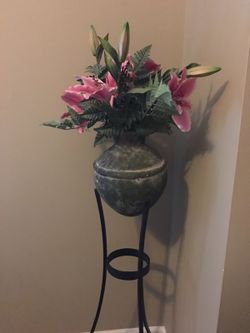 Pottery flower pot and wrought iron stand