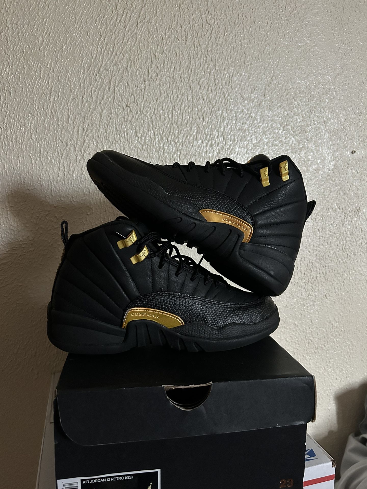 Black And Gold Jordan 12’s