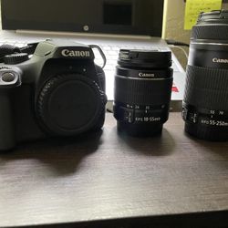 Canon Eos T100 With Two Lenses