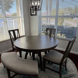 Round Dining Table Set. Includes 3 chairs and bench