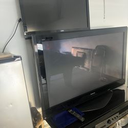 2 TV’s Plus An Stand 