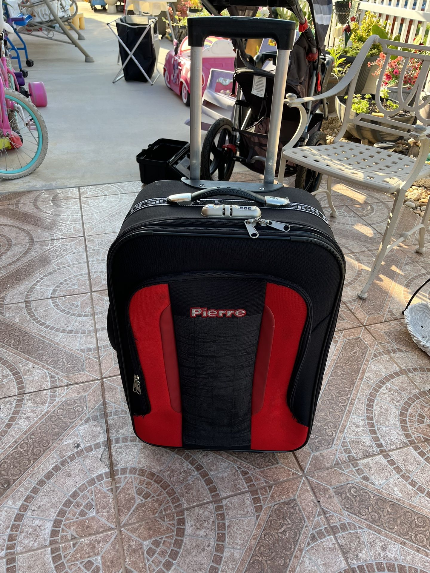 Medium suitcase measures 24 inches high, 17 inches wide, and 9 inches deep. It rolls very well and is clean
