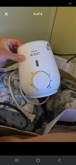 Imani wireless breast pump w/ bottle warmer milk storage bags