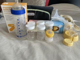 Medela manual single breast pump with milk storage and bottles