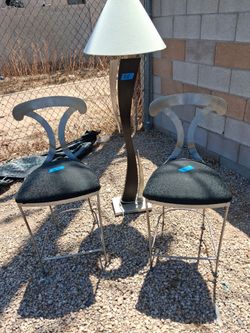 2 bar stools and and tall lamp