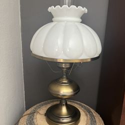 Vintage metal lamp with antique brushed brass-tone finish