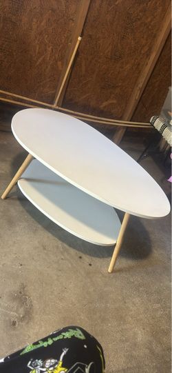 Oval White Coffee Table with Lower Shelf