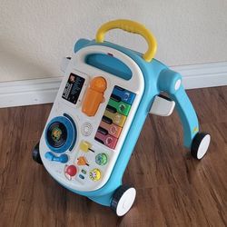 Baby Learning Toy And Walker ( See all pictures).