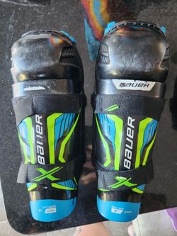 Kids Bauer youth hockey shin and elbow pads