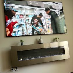 75” Samsung TV + 60” Fireplace – Brand New – $500 for Both