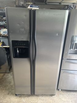 Energy Star Rated Frigidaire side by side refrigerator stainless steel