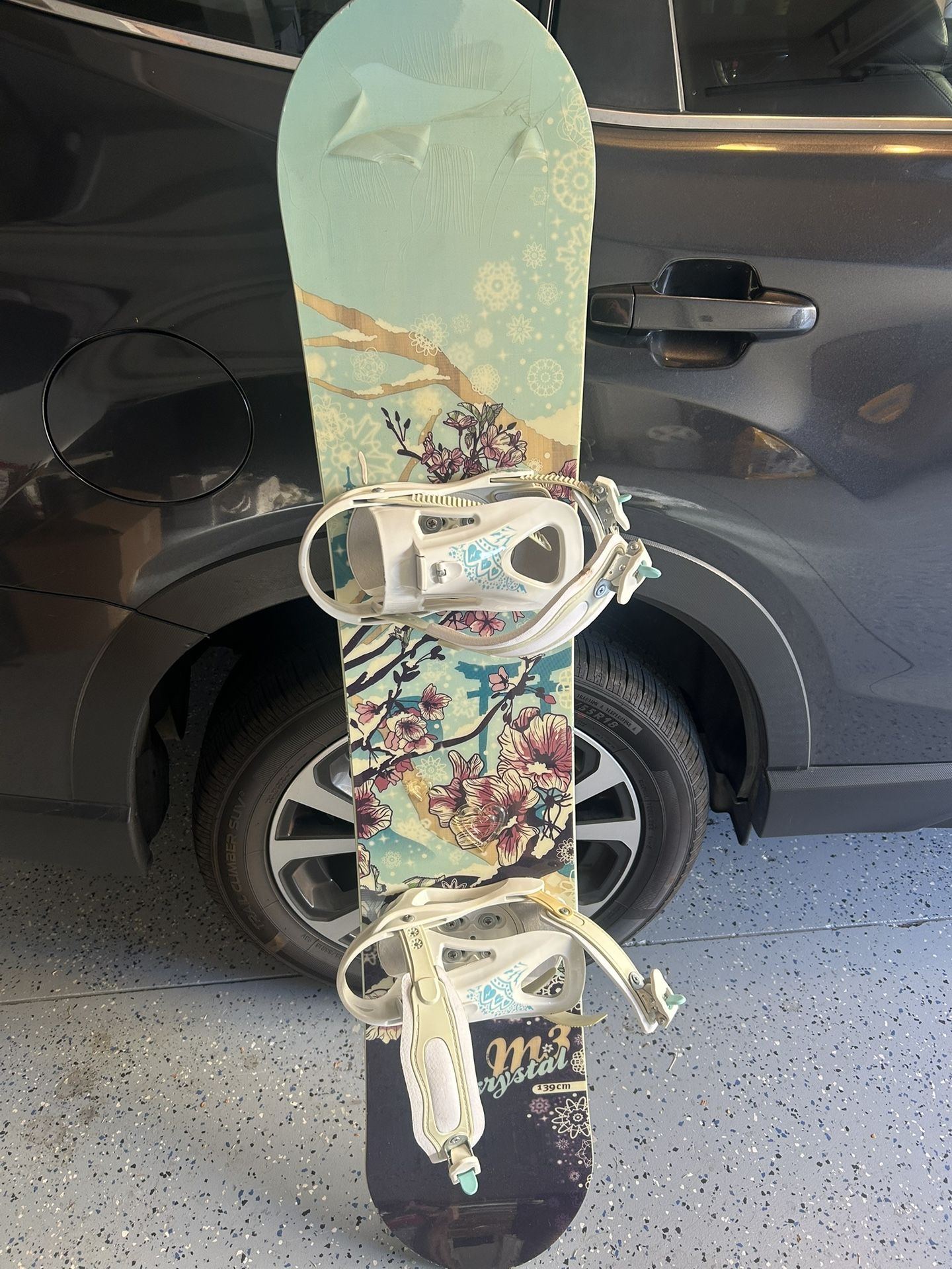 M3 Krystal snowboard and Vans Boots