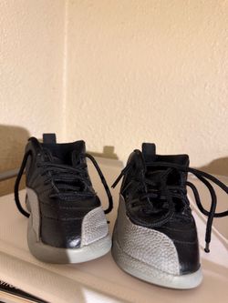 Air Jordan 12 Retro "Barons" (Black and Wolf Grey) toddler/little kids' shoes.
