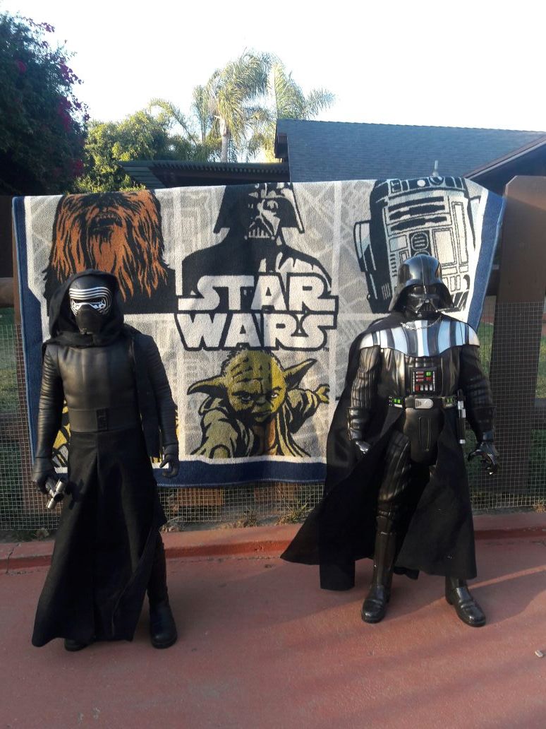 Darth Vader and Killoren action figures with Star Wars rug.