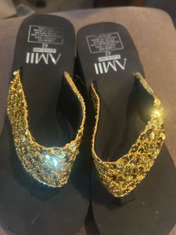 Gold/ Black flip flops Size 9