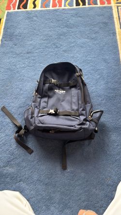 Skateboard Holding Backpack