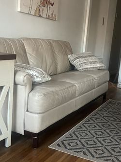 Leather Sofa and Loveseat Plus Ottoman