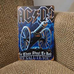AC DC METAL SIGN.  12" X 8"  NEW. PICKUP ONLY