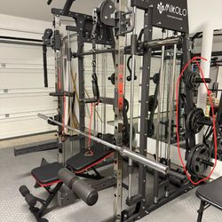 Home Gym + 255lb Weights, Bench And 45lb Barbell