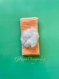Hand knitted girls headband, ear warmer with 3D flower