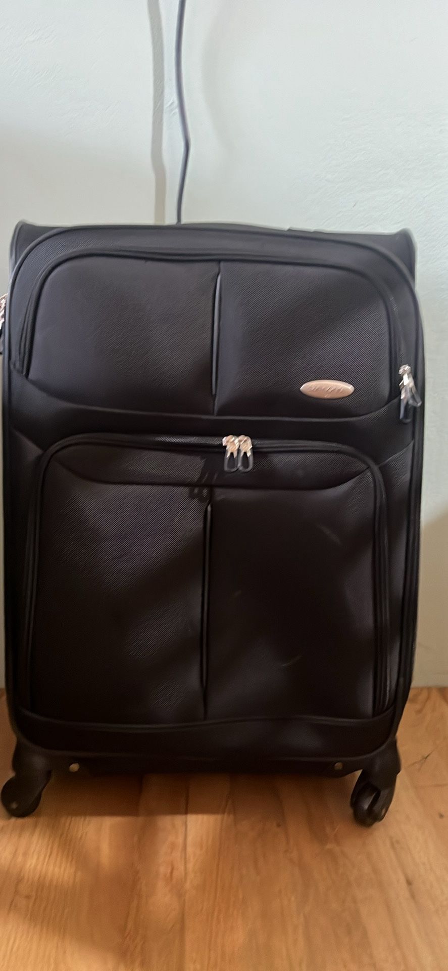 Samsonite Rolling suitcase 