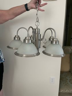 Matching brushed nickel chandelier and ceiling light