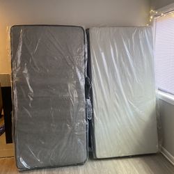2 Twin Mattress And Box springs 