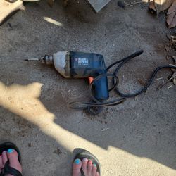 Black and Decker corded drill.