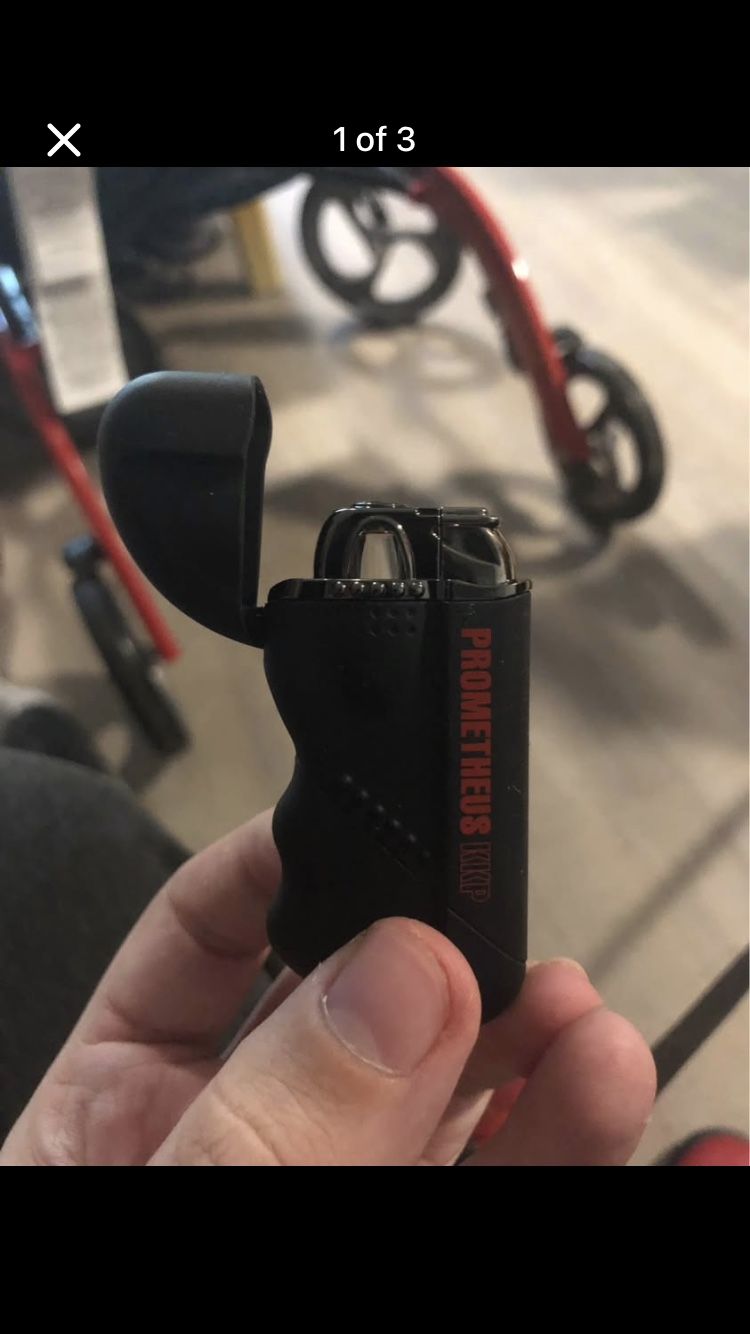 Vintage PROMETHEUS KKP Black and Red Lighter