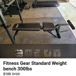 BENCH PRESS WITH 70 POUNDS WEIGHT PLATES  AND BAR AND Z BAR
