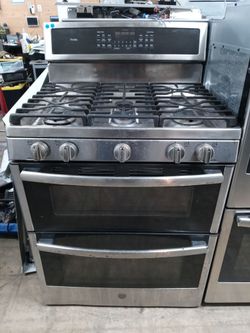 GE stainless steel 5-burner double oven propane-converted stove - Free delivery