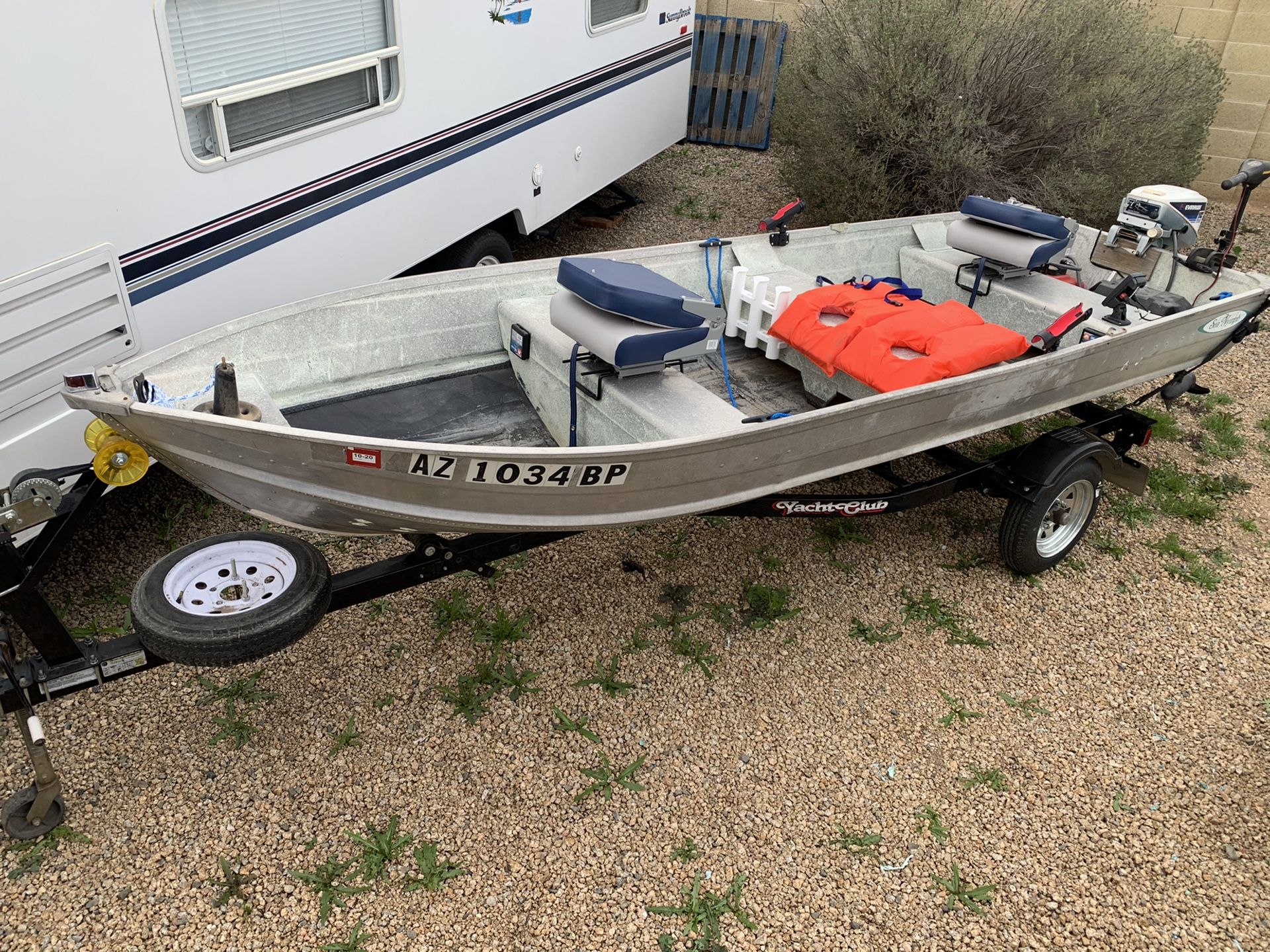 14’ aluminum boat and trailer with 15hp outboard
