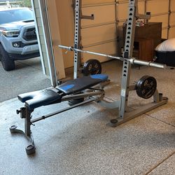 Weight Bench With Olympic Bar and Weights!!