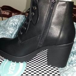 NEW with tags and it's original box women's boots size 10 black leather super comfortable and elegant design NEVER used  $45