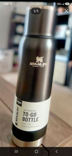 Brand new beautiful large 8 cups standley thermos ( never used ).