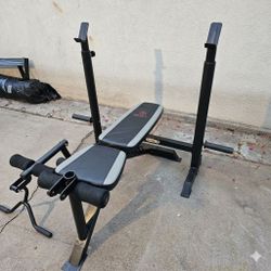 Olympic weight rack and adjustable weight bench
