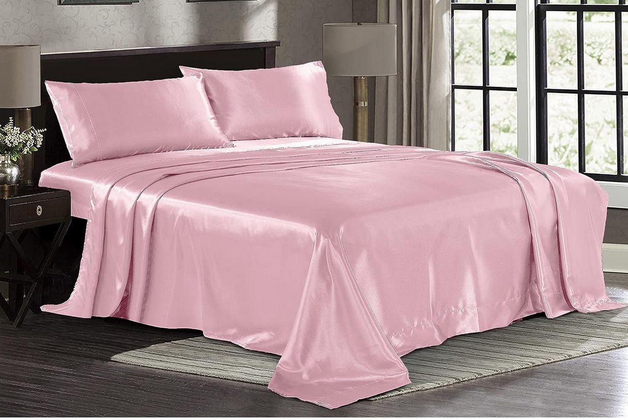 4 Piece Set of Silky Pink Sheets for a Queen Size Bed