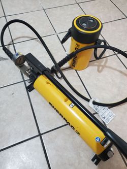 Enerpac rc-506 and p80 two speed pump with hose/ gauge. Never used. Non negotiable price.