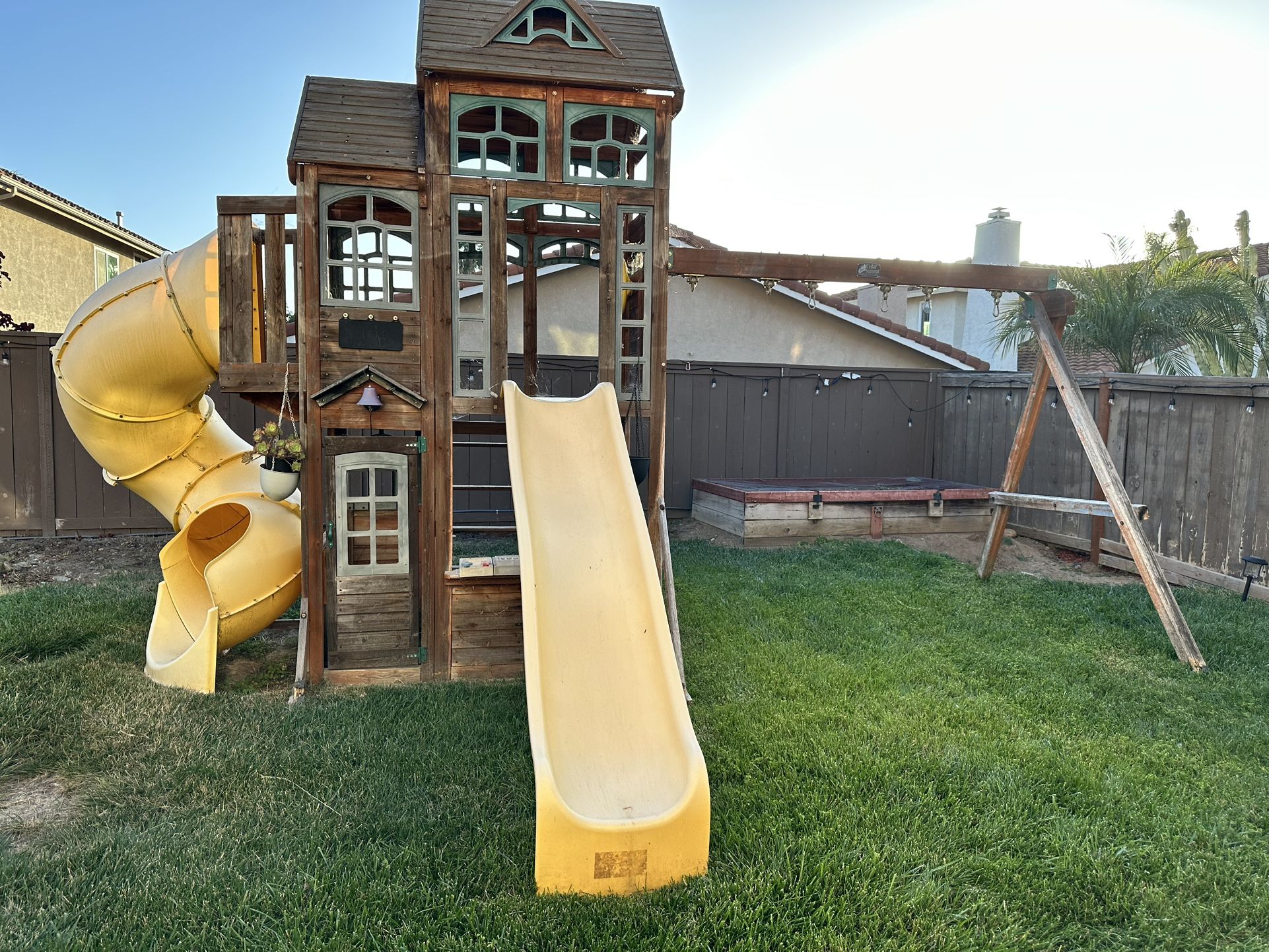 Outdoor Swing Sets with Two Sliders.