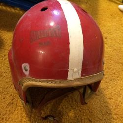 Spaulding size M youth football helmet &a shoulder pads. Pads are leather & plastic