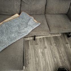Free couch 3 person with a storage foot rest gray