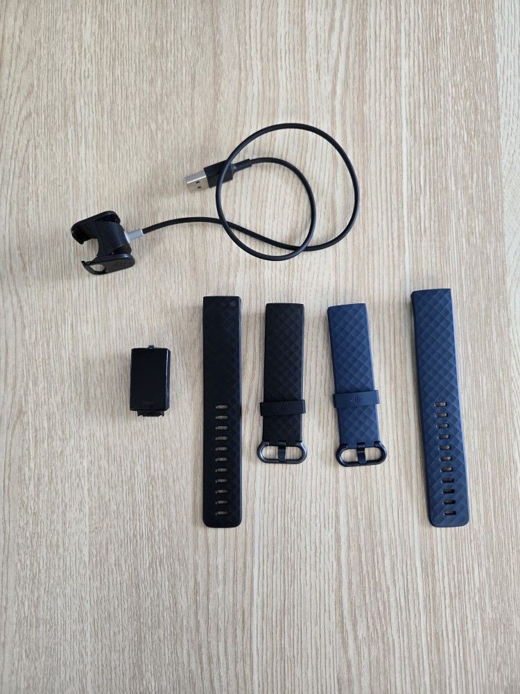 Fitbit Charge 4 Activity Tracker with Extra Bands and Charger