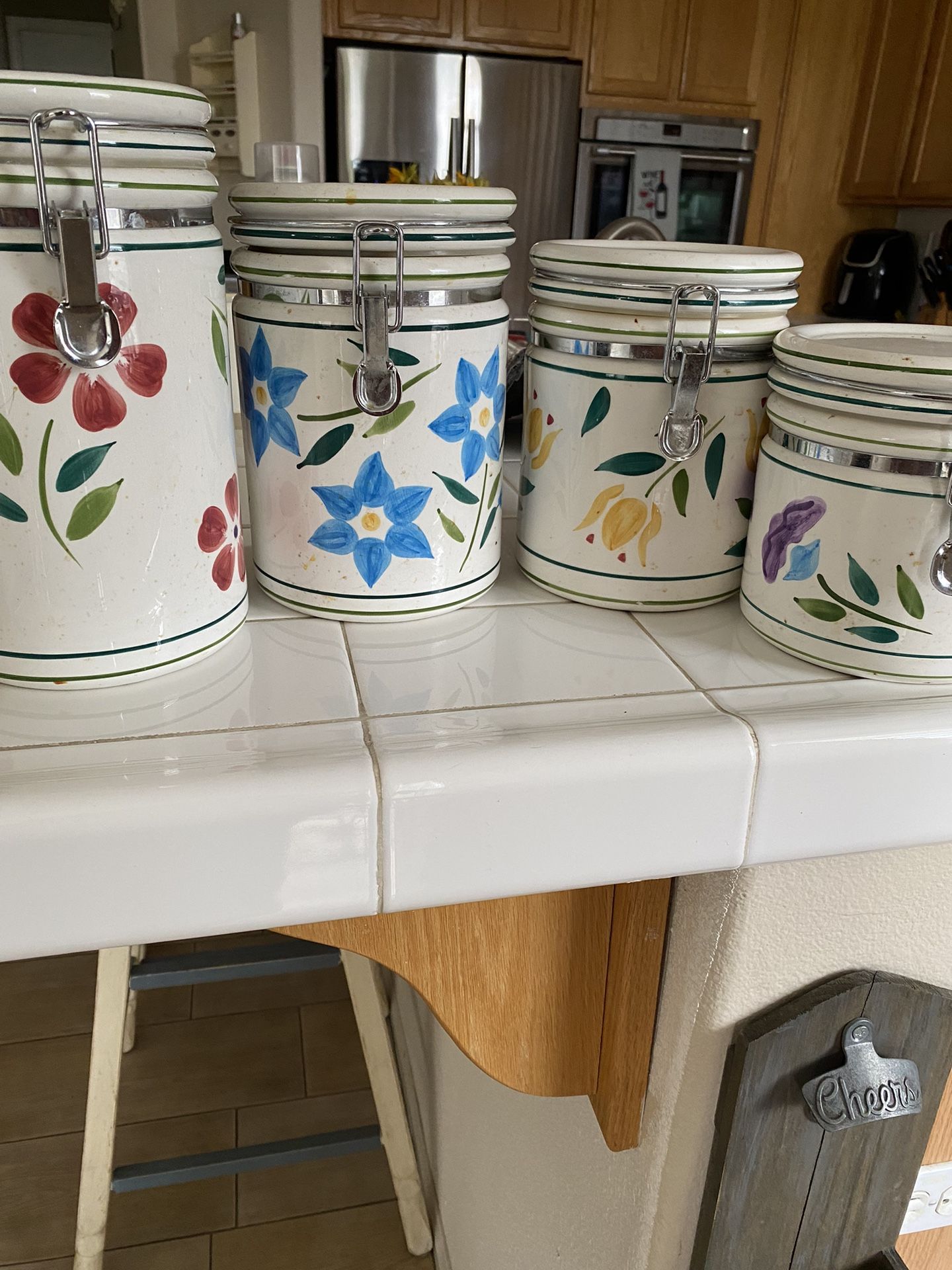 For Verona, ceramic flower canisters