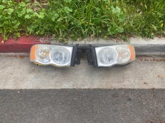 Ram 1500 02-05 headlamp pair w/ headlight bulbs OEM