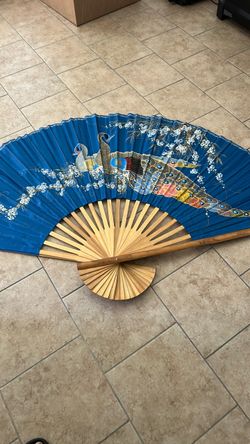 Handcrafted oversized fan with bamboo frame